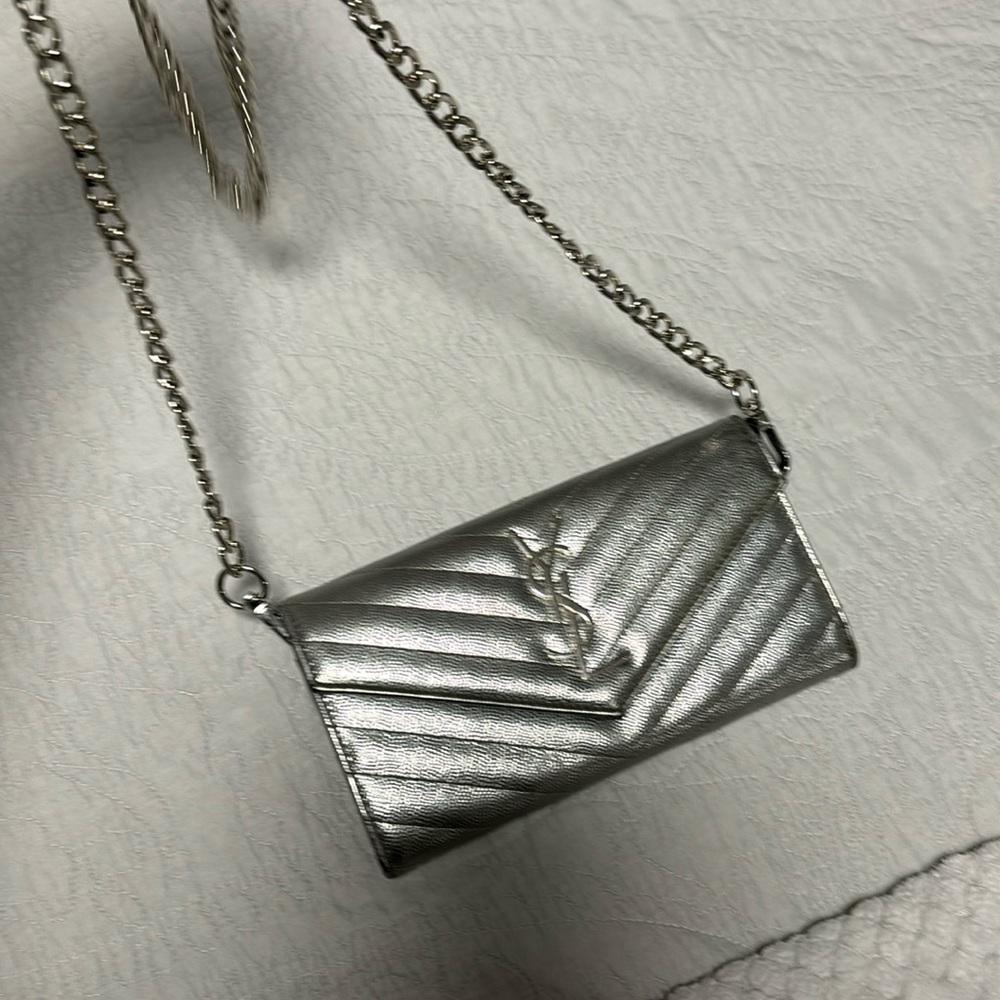 Silver YSL cassandre wallet on chain